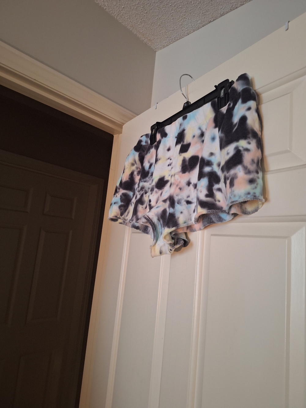 Colsie Tie-Dye Plush Lounge Shorts in Black, White, Pink, Blue, Yellow